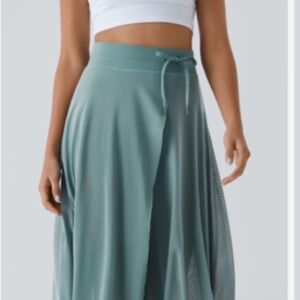 HALARA Mineral blue A-Line Skirt Size Medium with shorts and tie waist.